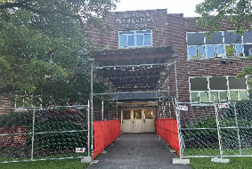 Colerain Elementary School with scaffolding erected at the front door of the building 